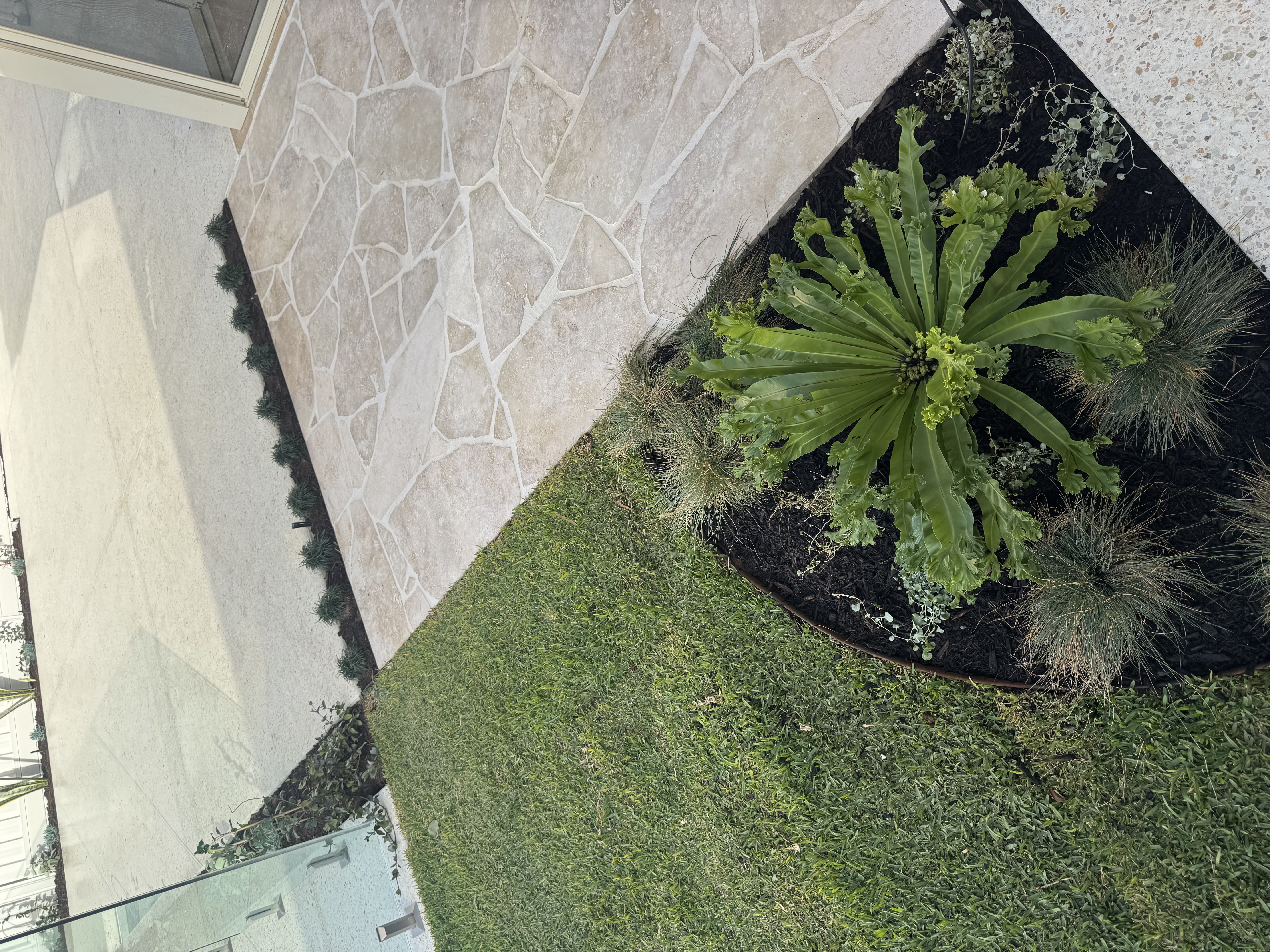 Premium natural stone paving and driveway installed in a Perth coastal suburb