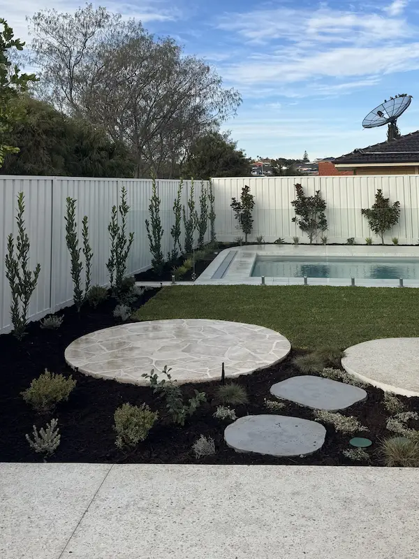 Full outdoor living transformation with decking, paving, and garden design in Perth
